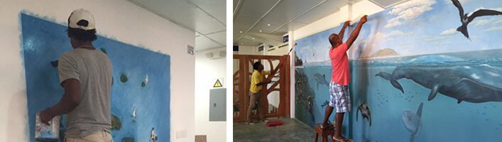 Local artists painting the 'Charles Darwin' Exhibition Hall
