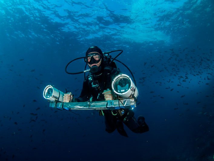 Scientist David Acuña, carrying out a DOVs transect at Wolf Island.