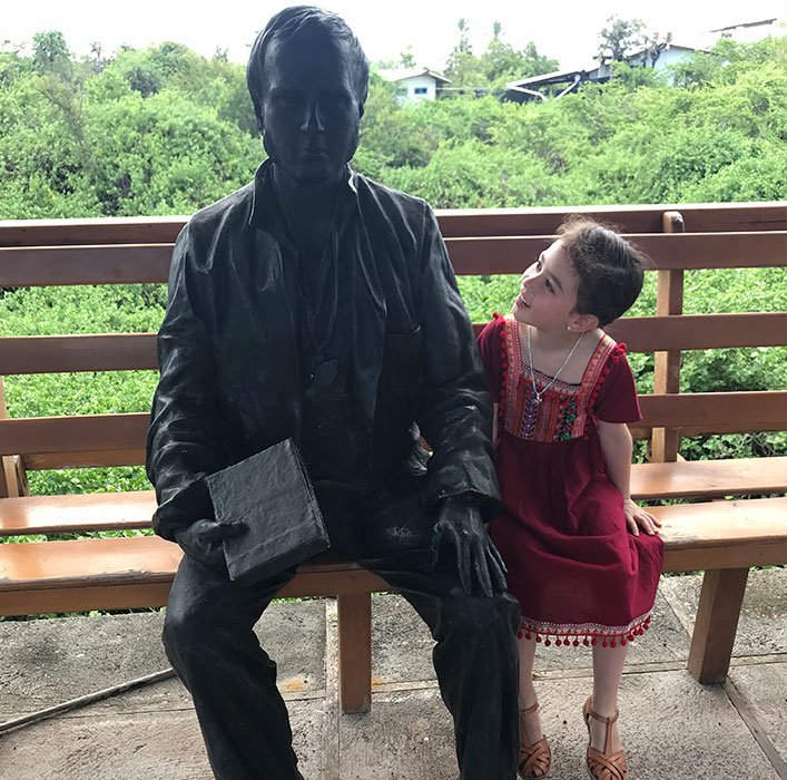 Sophie posing next to the Charles Darwin statue