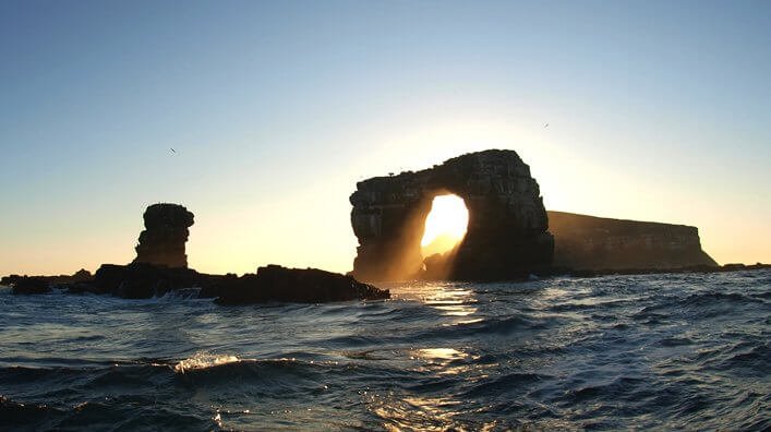 Sunset through Darwin's Arch.