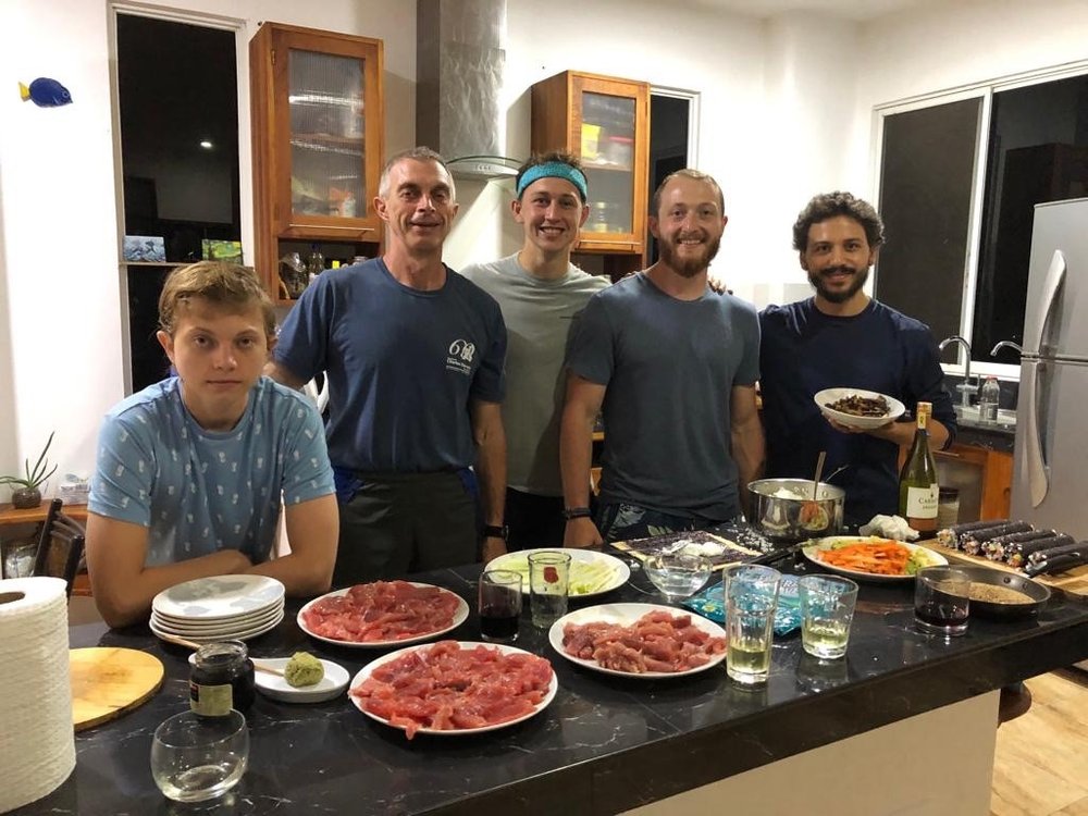 The research team enjoying fresh-caught Sushi on the last night of the experience. 