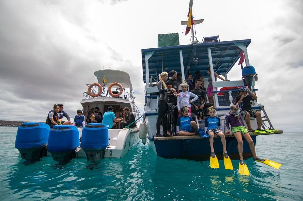 <em>Valeska</em> and <em>Queen Mabel</em> with crew ready to snorkel.